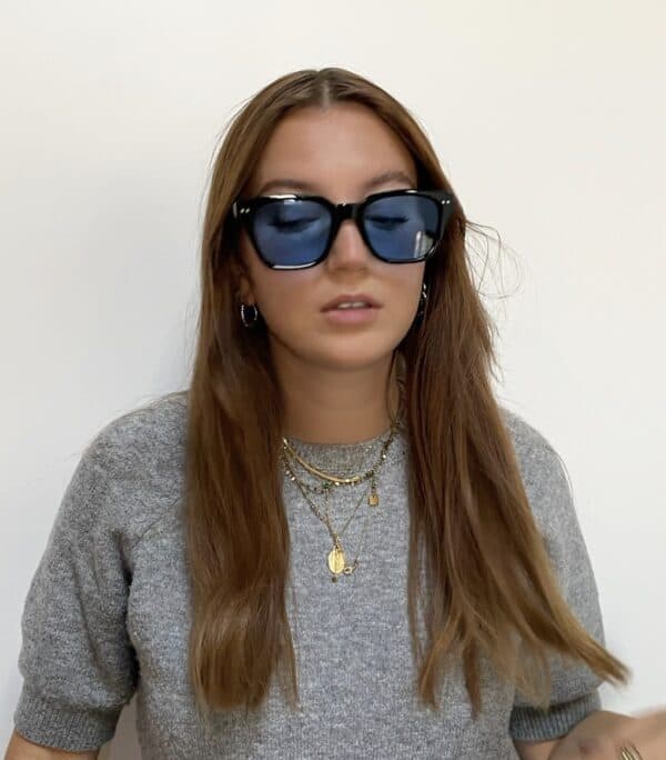 lunettes-soleil-unisexe-noir-bleu-portée-zona-hotelera Zona Hotelera